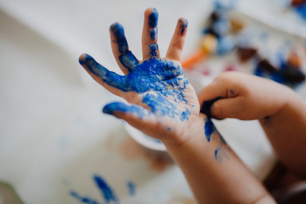 children playing with paint